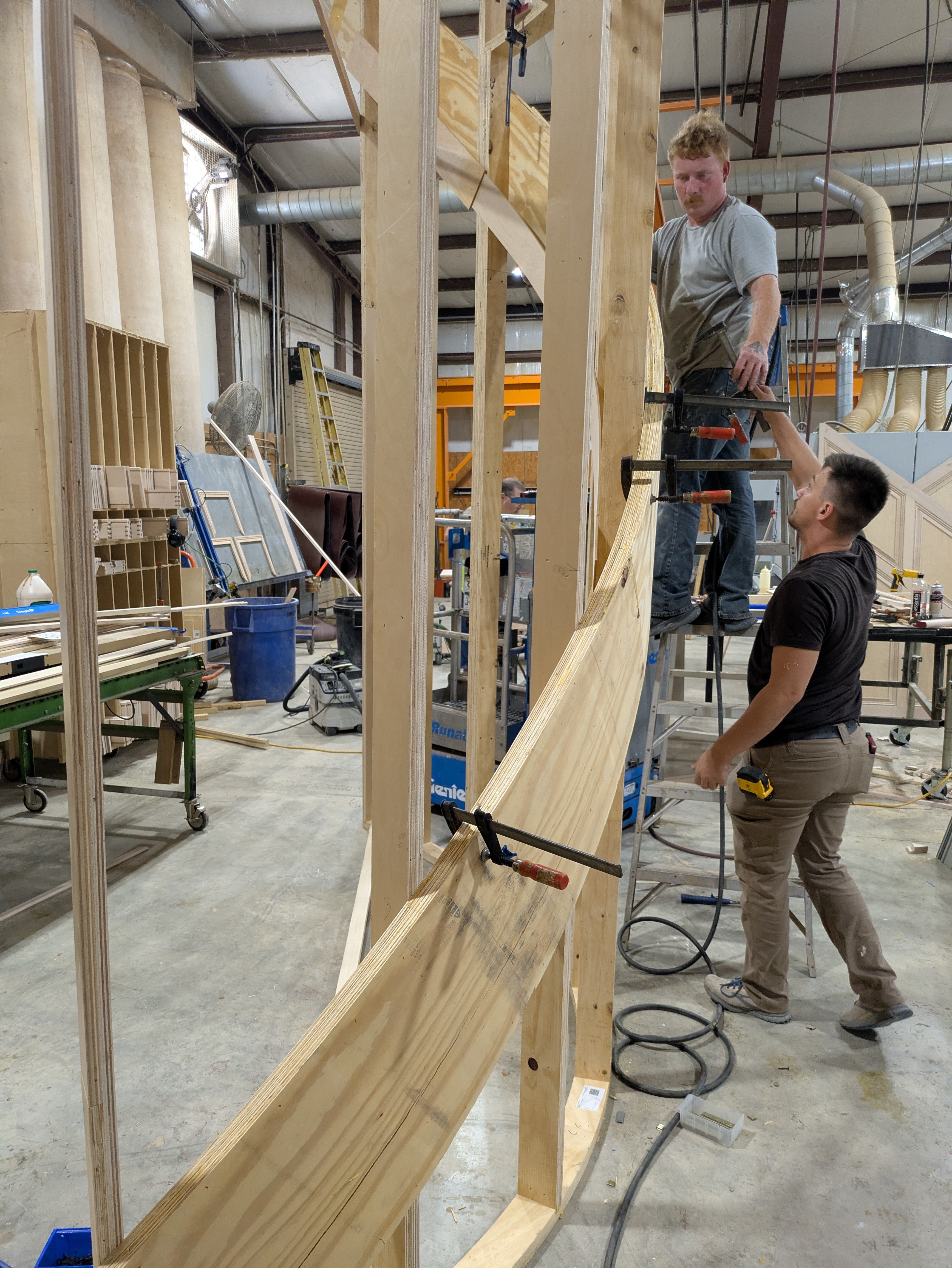 Custom stairway under construction in the shop